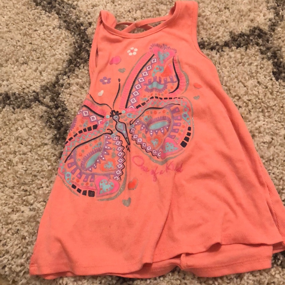 A pink butterfly shirt